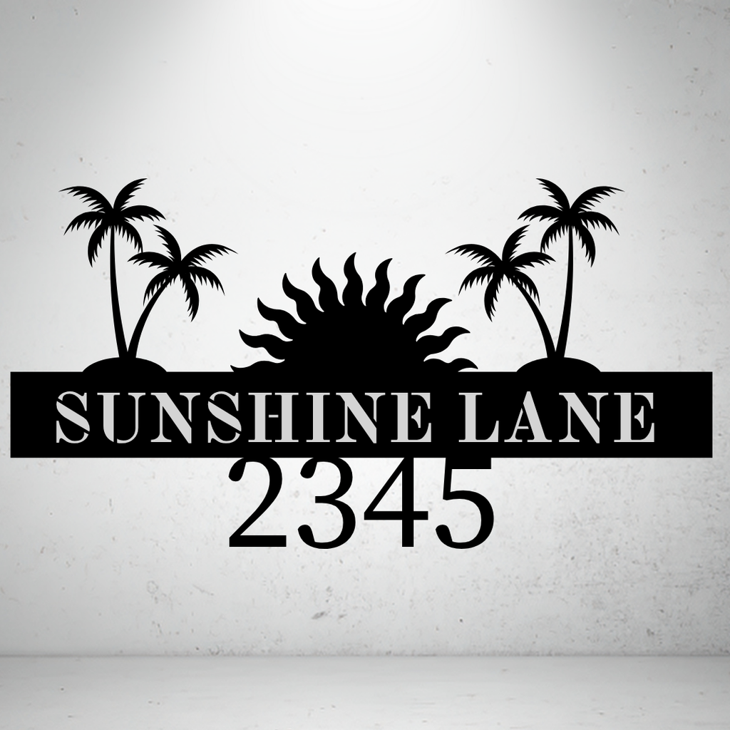 Metal house number sign with tropical palm tree design on a grey background