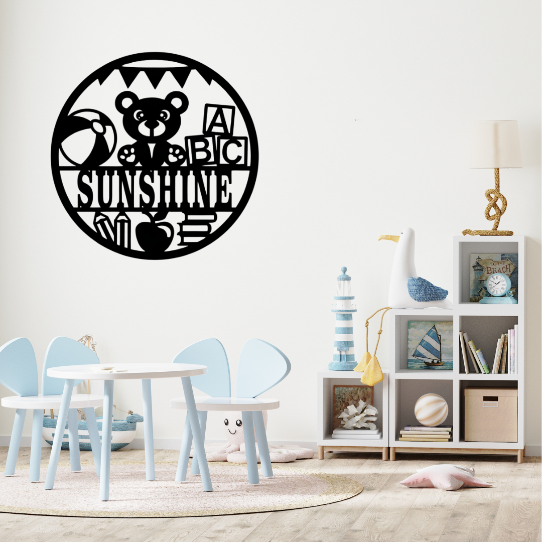 Learning-themed nursery décor styled above a toddler play area