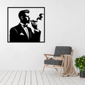 The Distinguished Gentleman cigar metal wall art displayed above a contemporary chair in a sophisticated modern interior