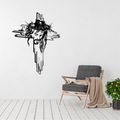 The Face of Faith Jesus cross metal wall art displayed above a contemporary chair