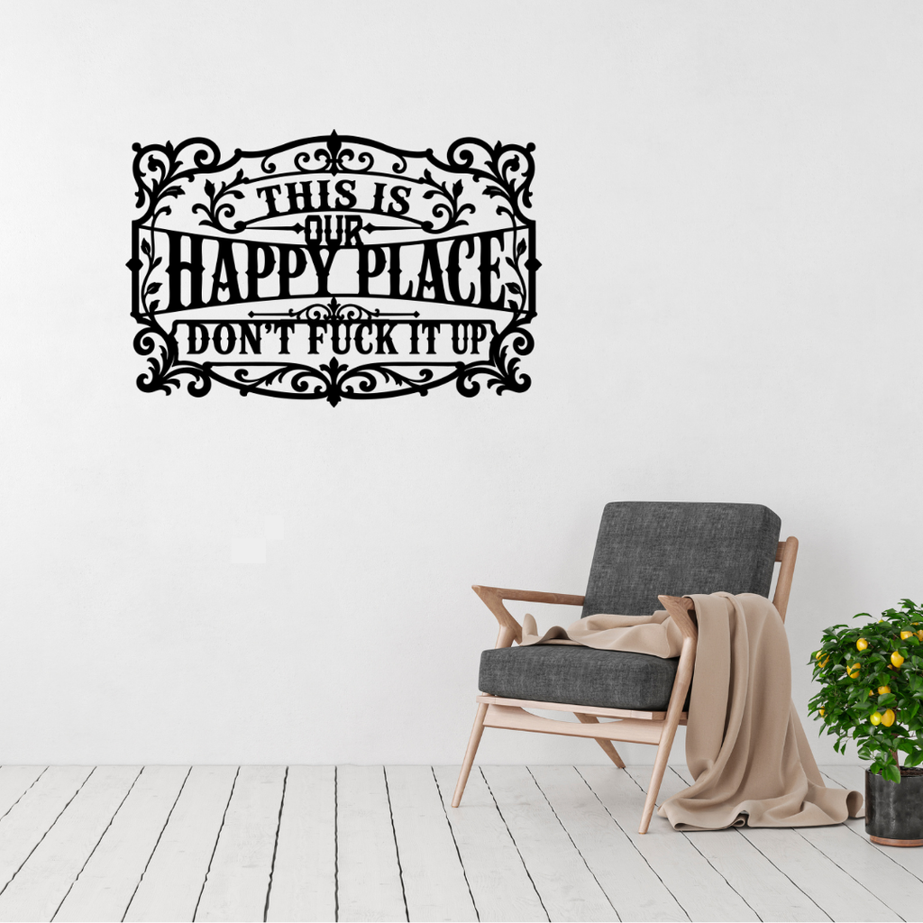 This Is Our Happy Place cheeky typography metal wall art displayed above a contemporary chair