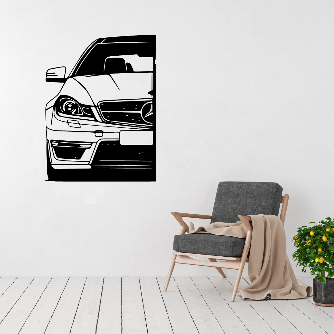 Three-Pointed Star Mercedes-Benz metal wall art displayed above a contemporary chair in a modern interior