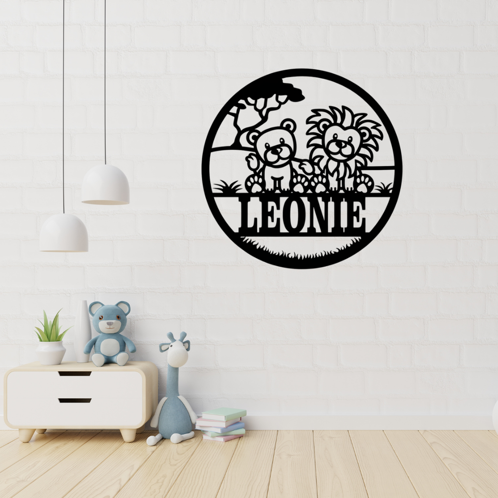 Lion cub metal wall art hanging in a safari-themed nursery room