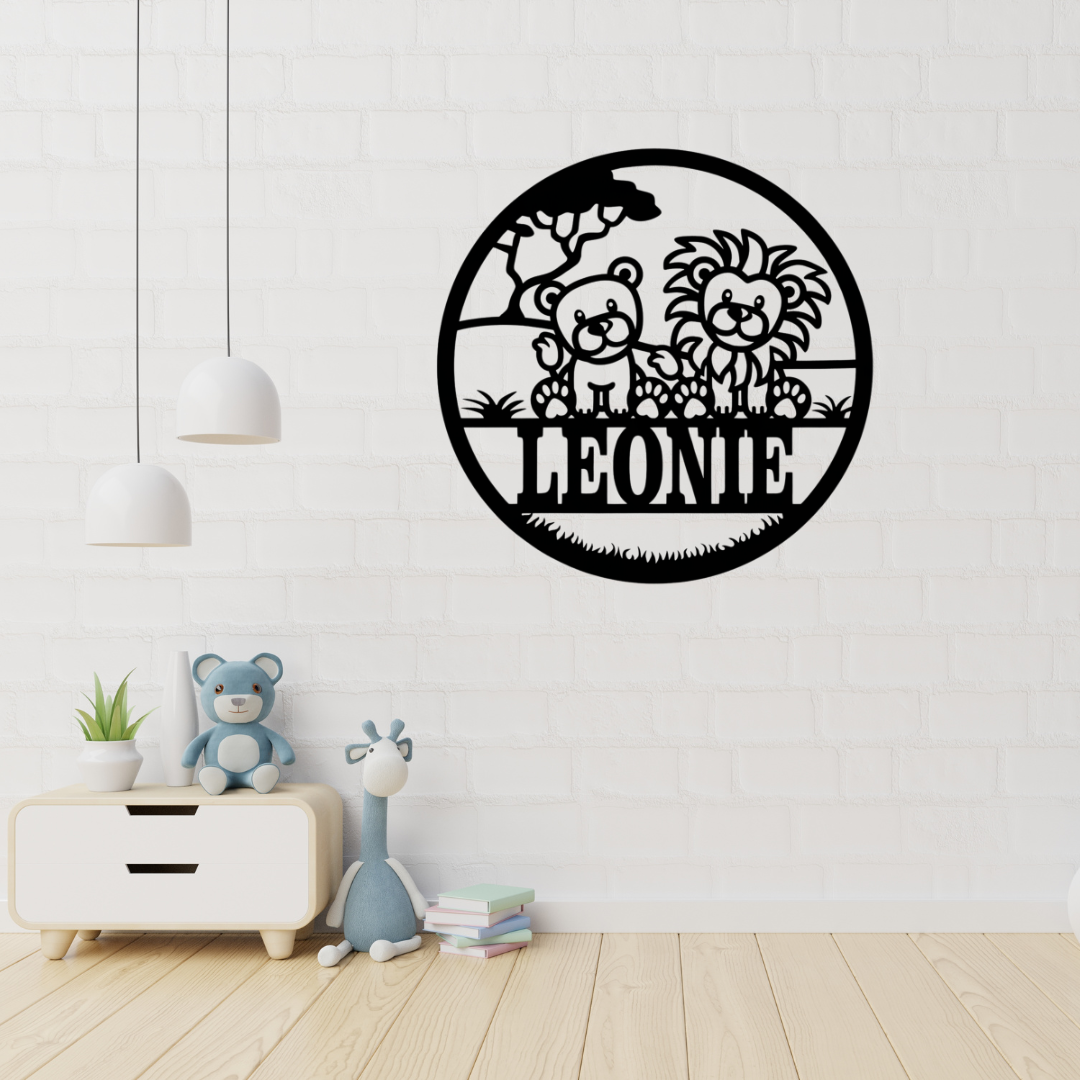 Lion cub metal wall art hanging in a safari-themed nursery room