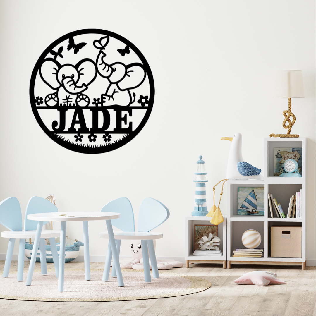 Cute elephant wall décor styled above a neutral nursery crib