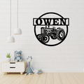 Rustic tractor metal wall art displayed in a farm-themed kids room