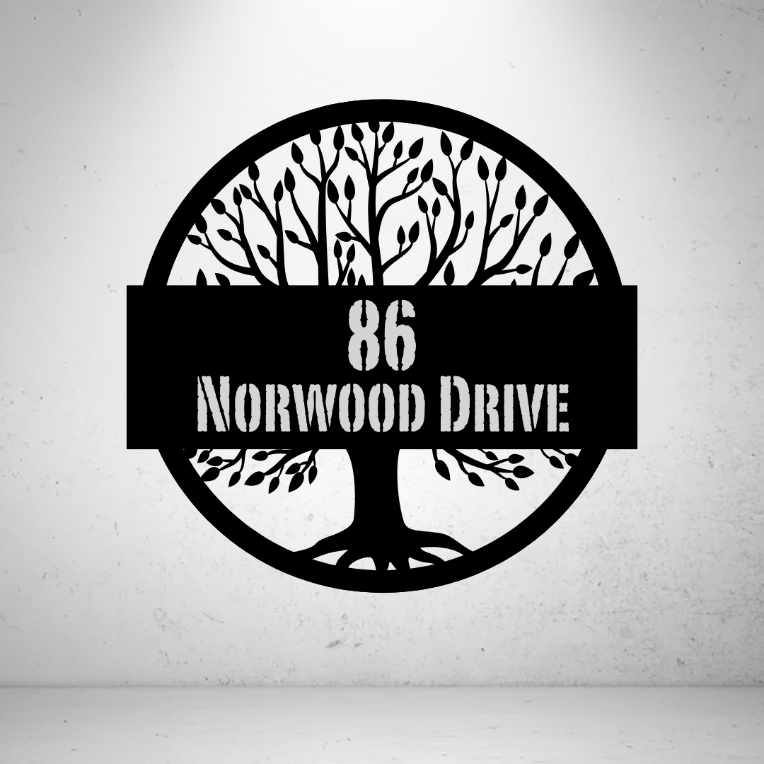 Metal house number sign with tree silhouette design on a grey background