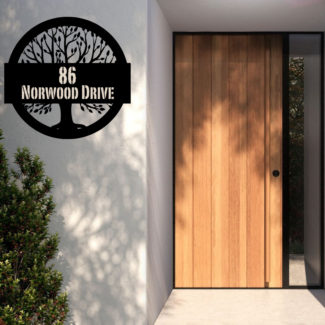Metal house number tree address sign displayed at a modern house entrance