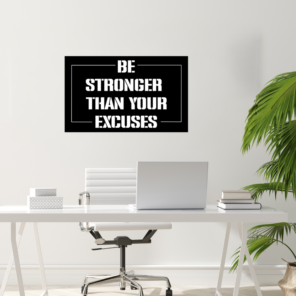 Unstoppable | Be Stronger Than Your Excuses Metal Wall Art installed above a modern office workspace.