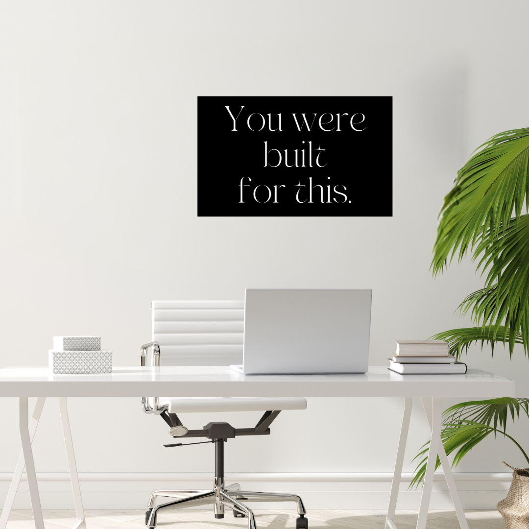 Unstoppable Fitness Inspired | You're Built For This Metal Wall Art showcased above a contemporary office desk.