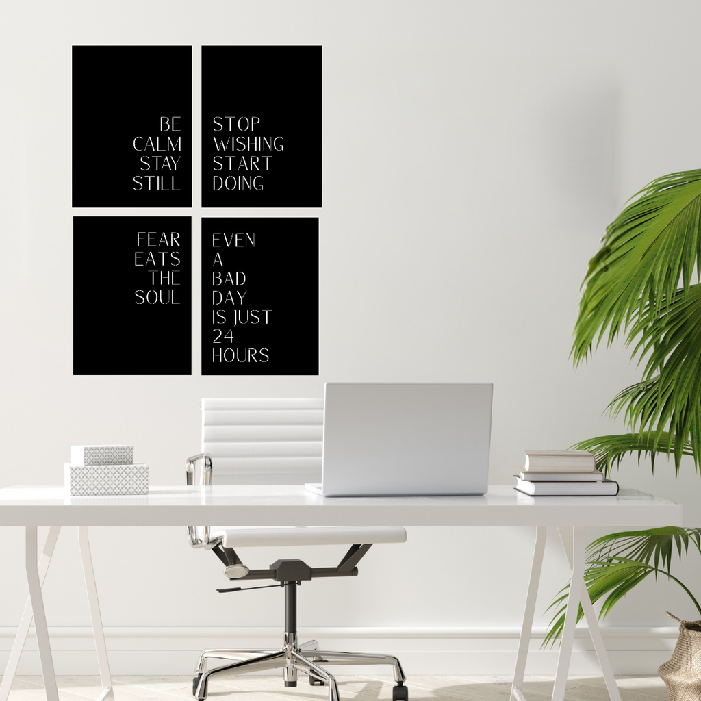 Unstoppable Mindset motivational typography metal wall art displayed above a modern office desk, creating an inspiring workspace with four contemporary quote panels.