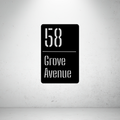 Metal house number vertical sign on a grey background with minimalist modern styling
