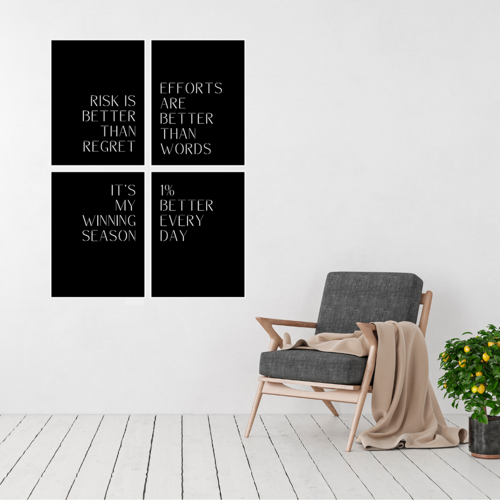 Winning Mindset motivational typography metal wall art set displayed above a modern lounge chair, featuring four inspirational quote panels in a minimalist design.