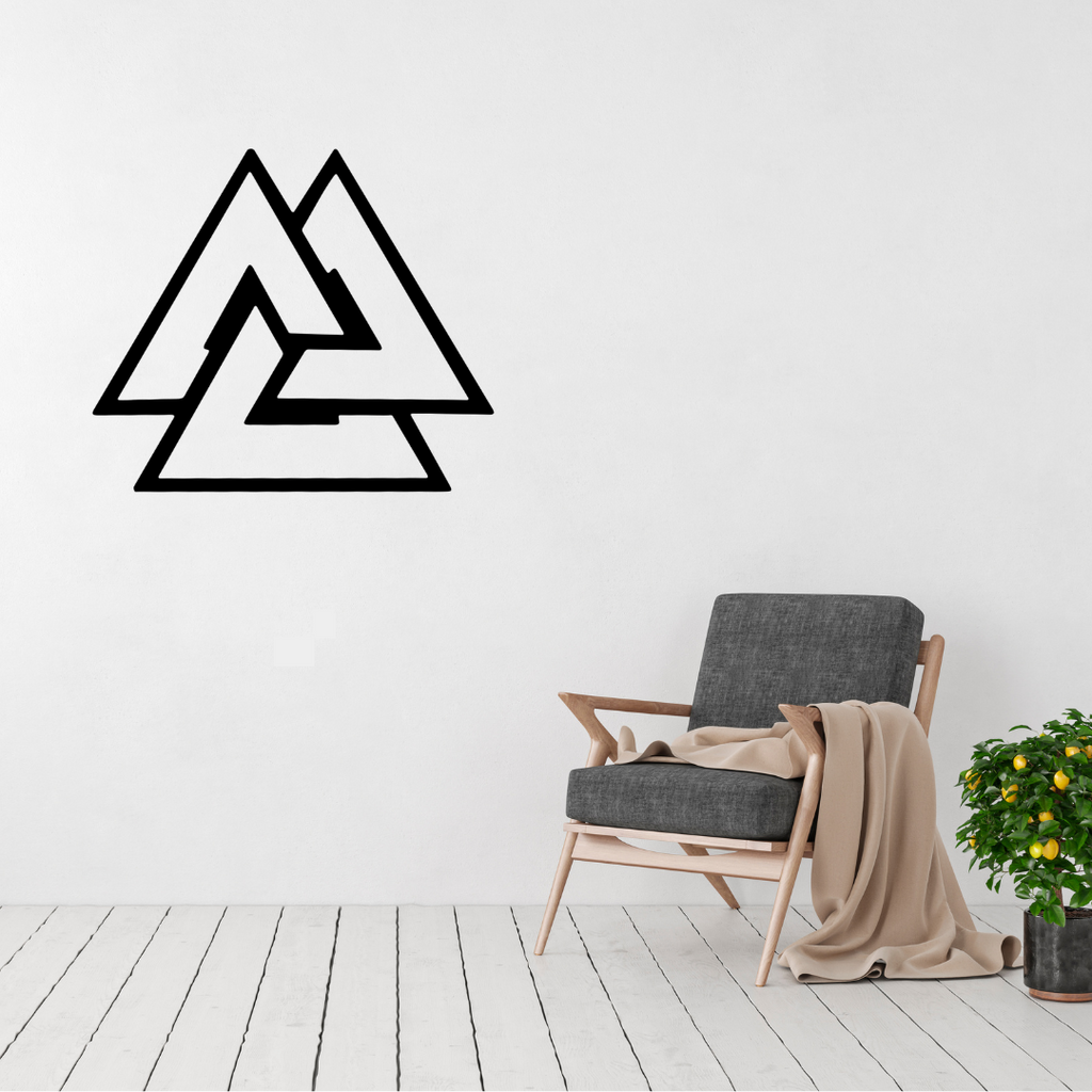 Symbol wall art displayed in a modern or masculine interior space