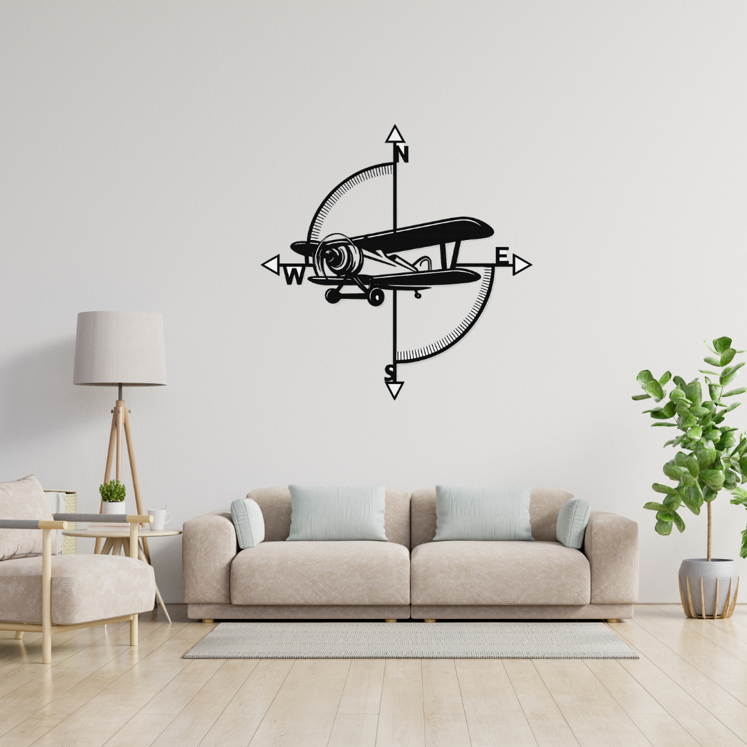 Vintage aviation compass metal wall art mounted above a modern sofa, adding an adventurous aviation theme to a contemporary living room.