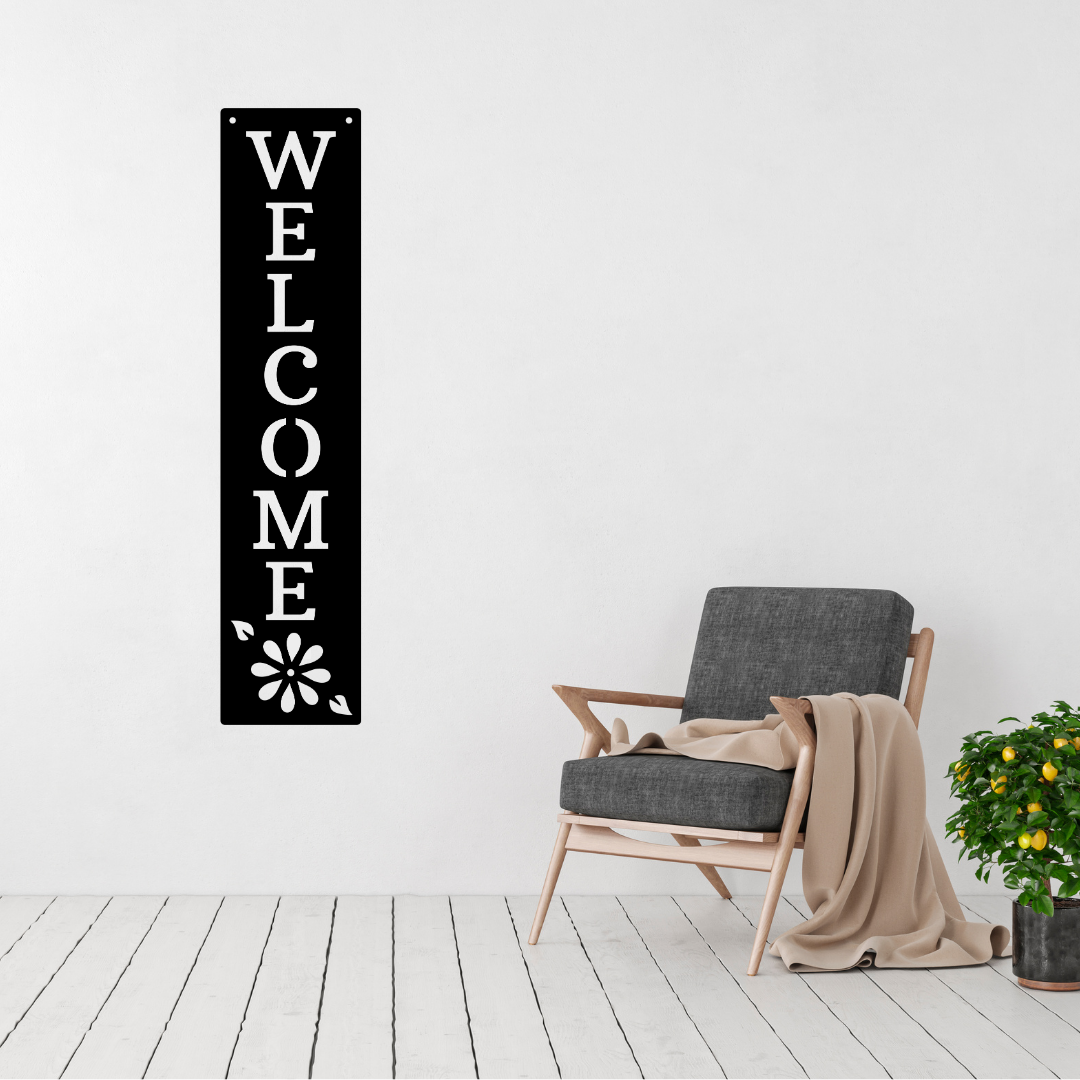 Warm Welcome | Welcome Vertical Metal Wall Sign displayed in a modern living room.