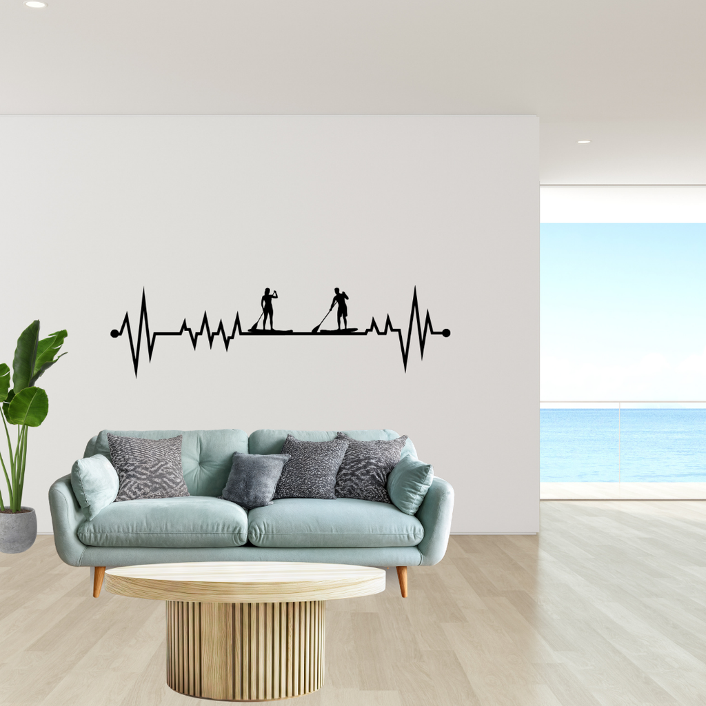 Waterbound Duo | Paddleboarding Heartbeat Metal Wall Art mounted on a contemporary feature wall above a sofa.