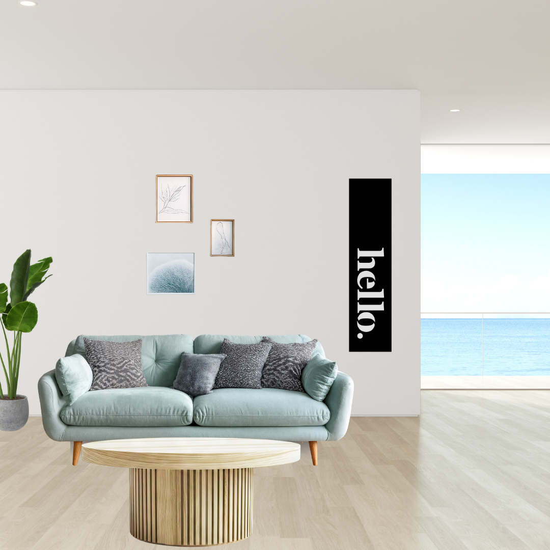 Welcome Home | Vertical Hello Metal Wall Art mounted in a bright contemporary living space.