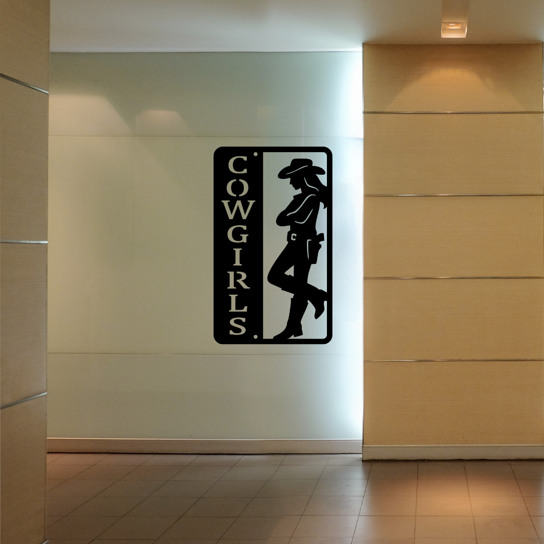 Western Charm | Cowgirls Bathroom Metal Wall Sign installed in a stylish commercial interior.