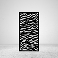 Wild Stripes animal-inspired metal privacy screen mounted against a light grey wall with flowing stripe pattern
