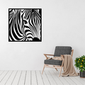 Wild Stripes | Zebra Portrait Metal Wall Art displayed in a bright modern living room.