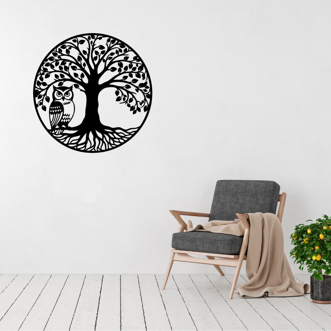 Wisdom in the Woods owl and tree metal wall art displayed above a contemporary chair