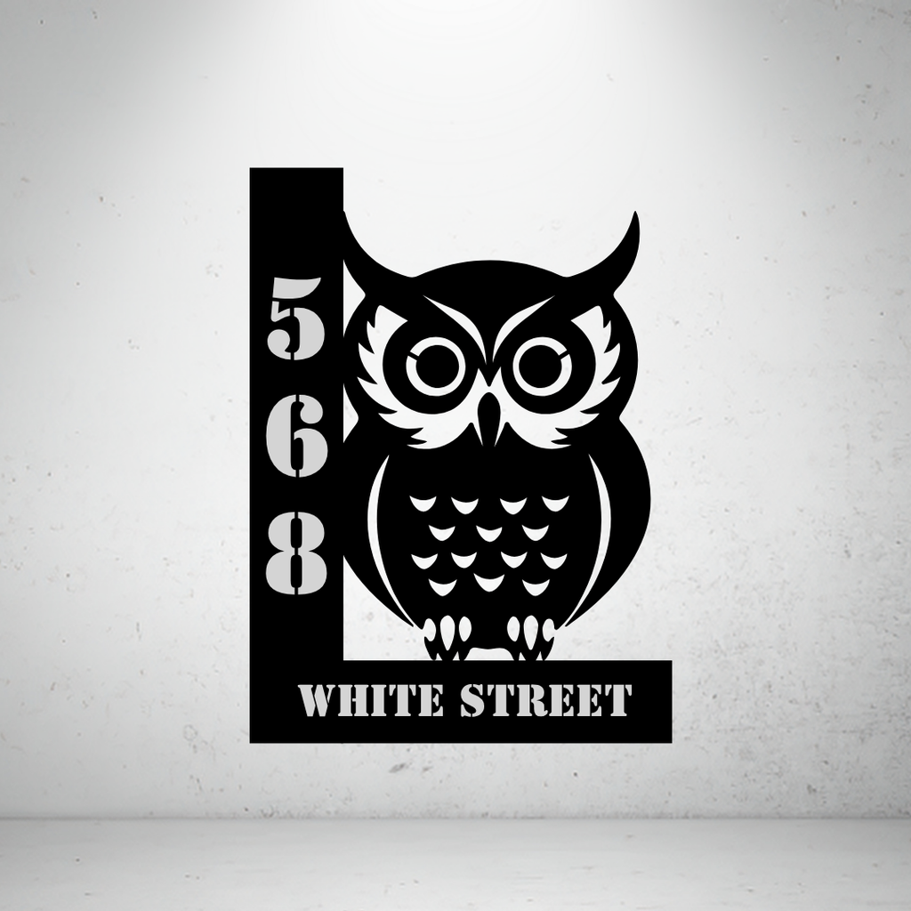 Metal house number sign with owl design on a grey background for modern home décor