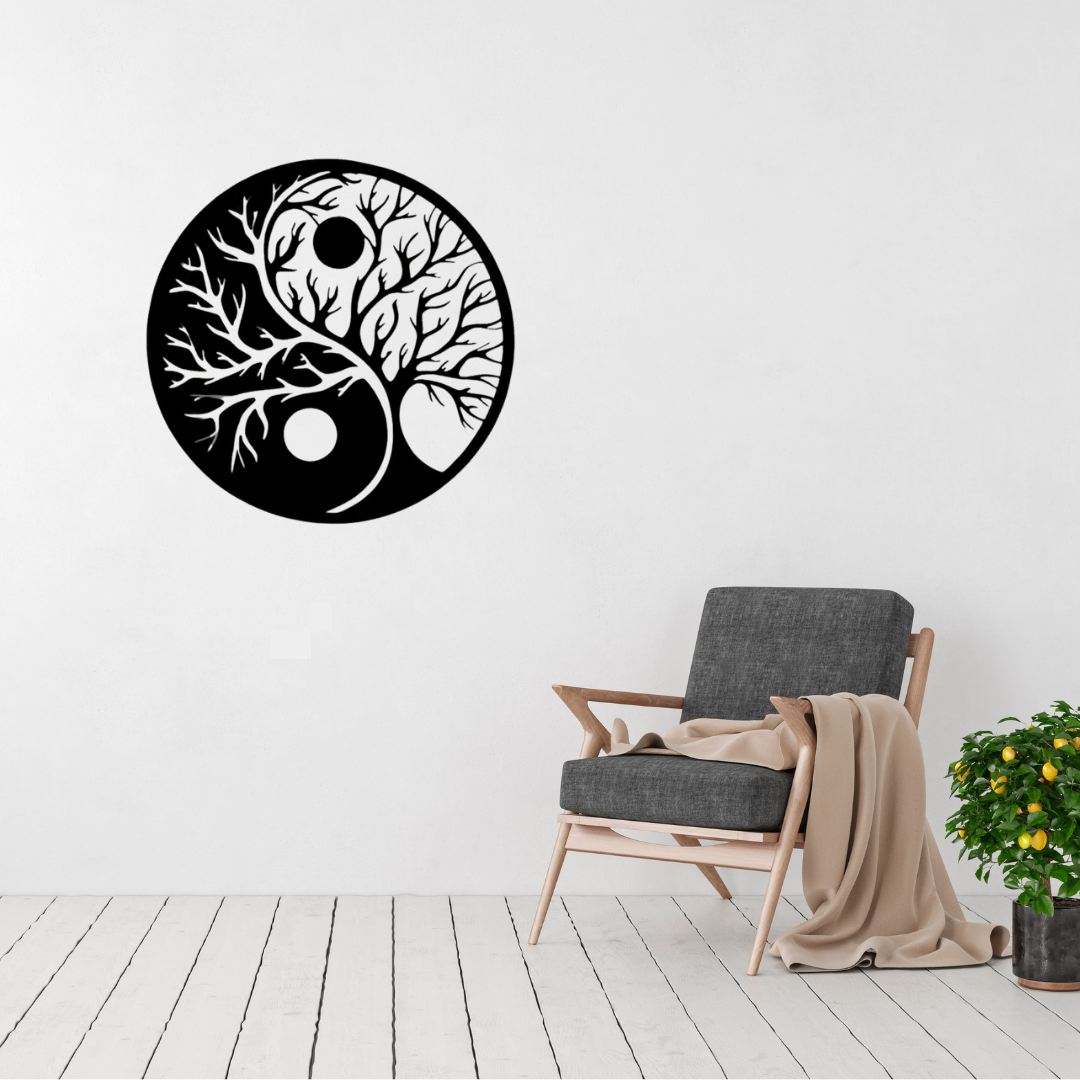 Yin Yang Tree of Life metal wall art displayed above a modern lounge chair, featuring intertwined tree branches within a circular Yin Yang design.
