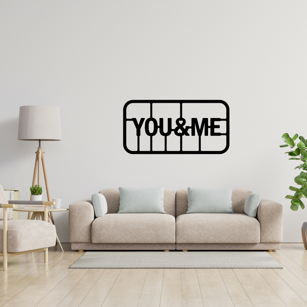You & Me | Romantic Typography Metal Wall Art showcased above a contemporary sofa in a modern living room.
